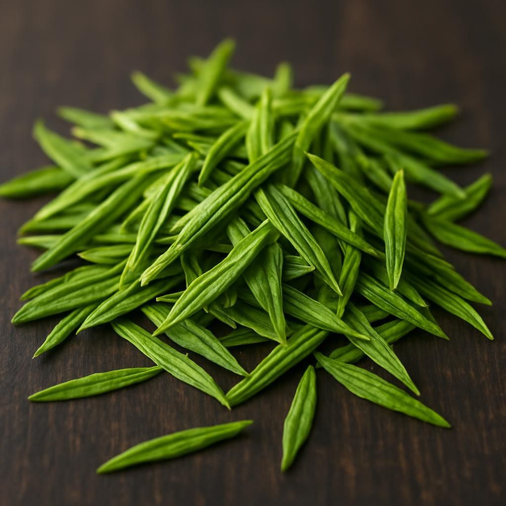Fresh Dragonwell Longjing green tea leaves showing characteristic flat shape and vibrant jade color